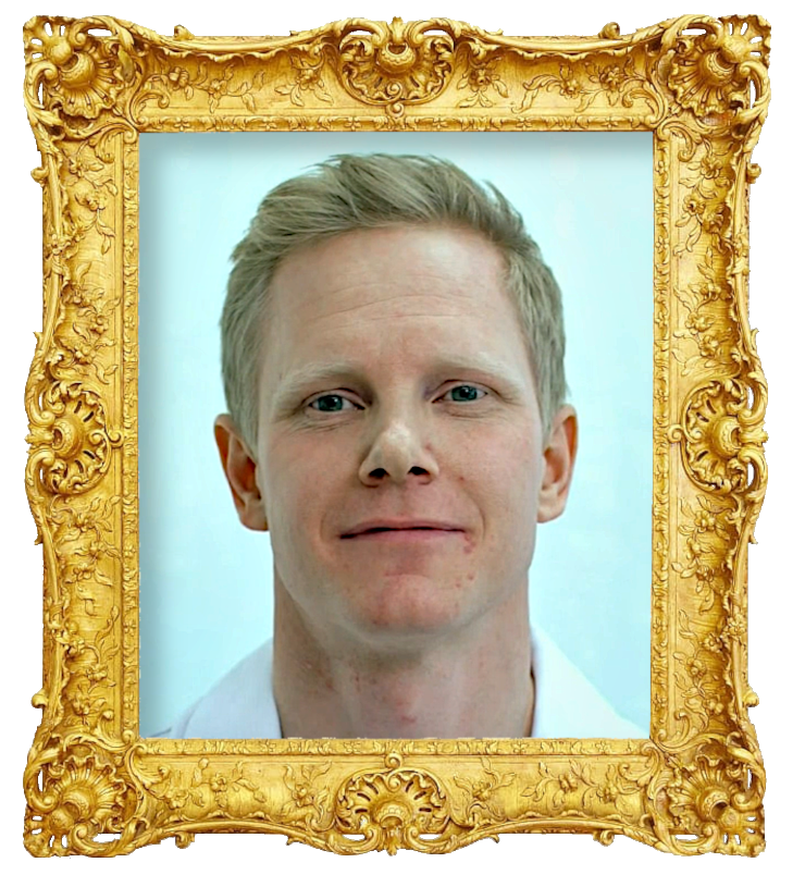 Headshot photo of Fred the Swede surrounded with an ornate golden frame.