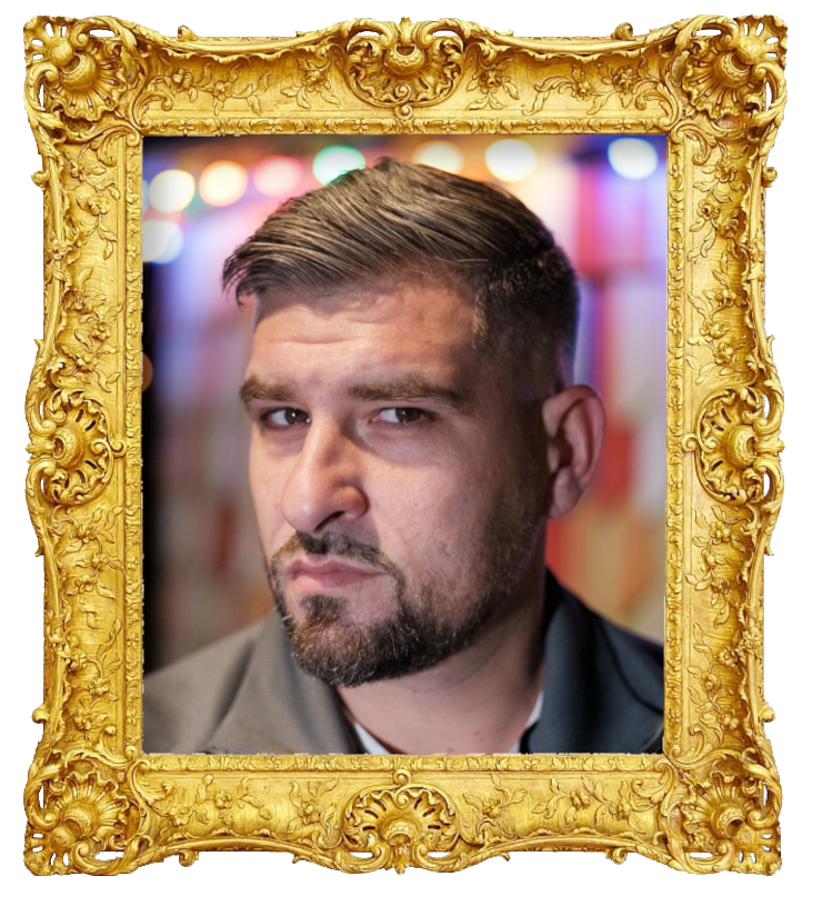 Headshot photo of Leo Ajkic surrounded with an ornate golden frame.