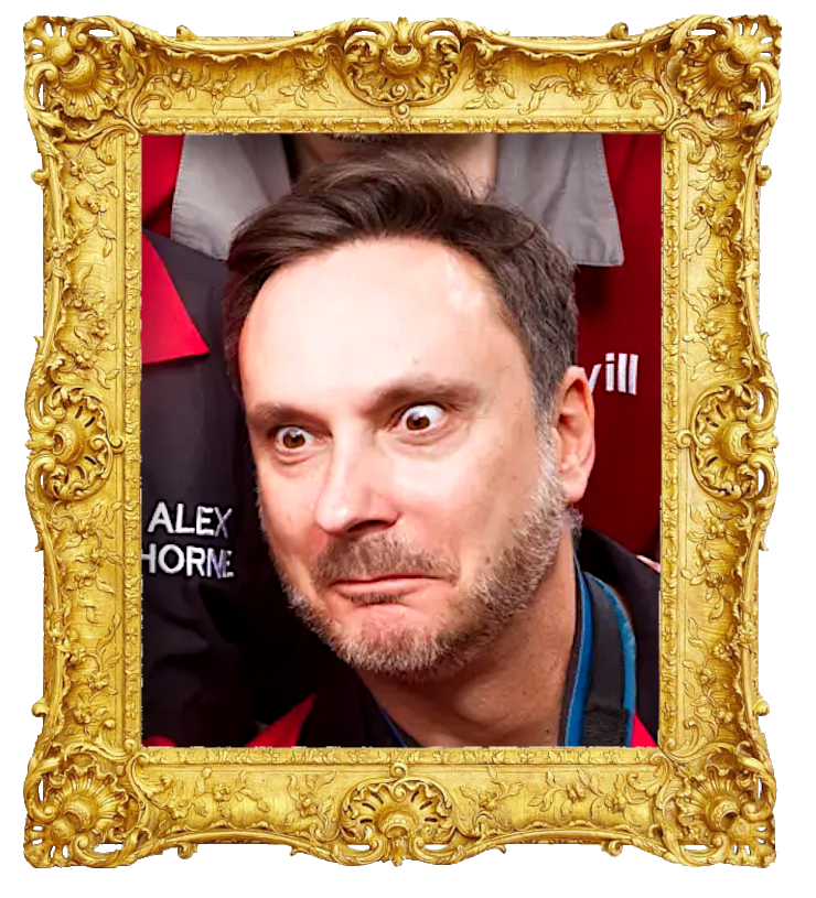 Headshot photo of Ed Sheldrake surrounded with an ornate golden frame.