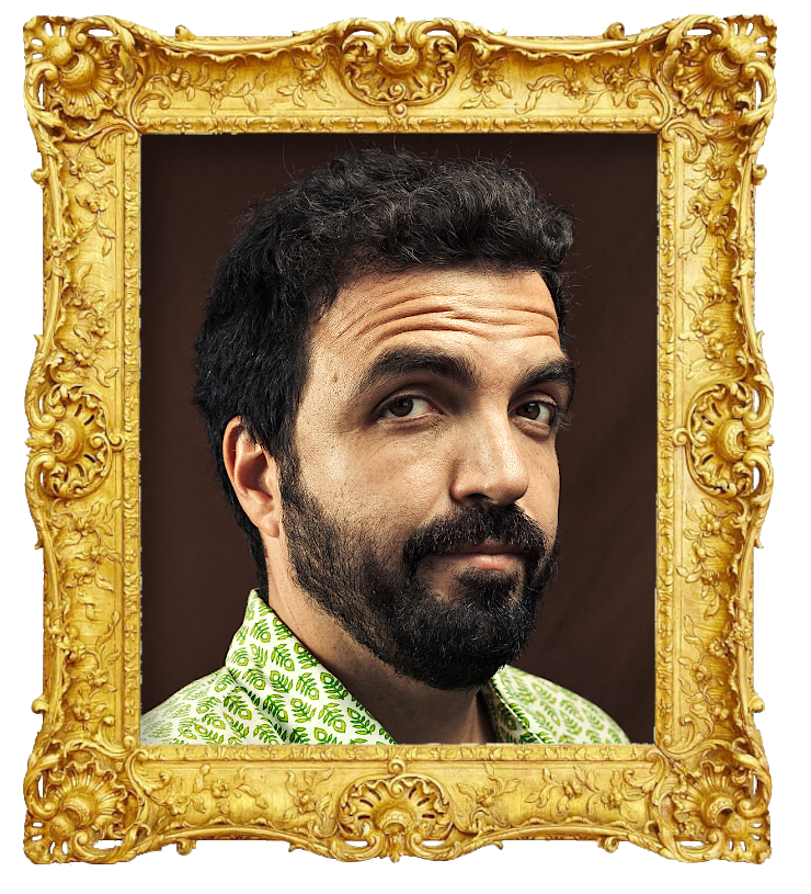 Headshot photo of Salvador Martinha surrounded with an ornate golden frame.