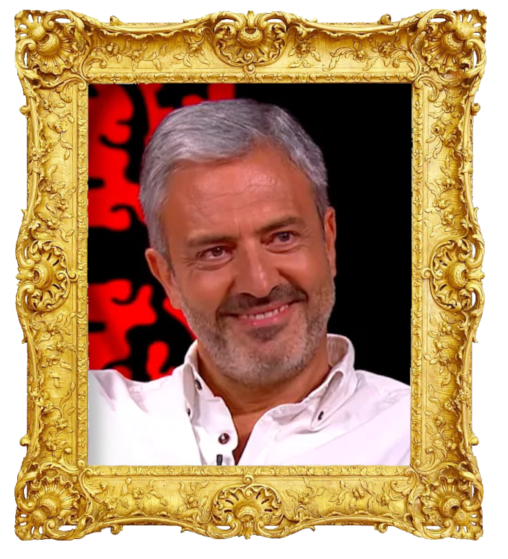 Headshot photo of Carlos Daniel surrounded with an ornate golden frame.