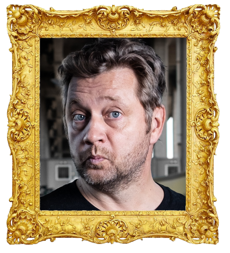 Headshot photo of Johan Petersson surrounded with an ornate golden frame.