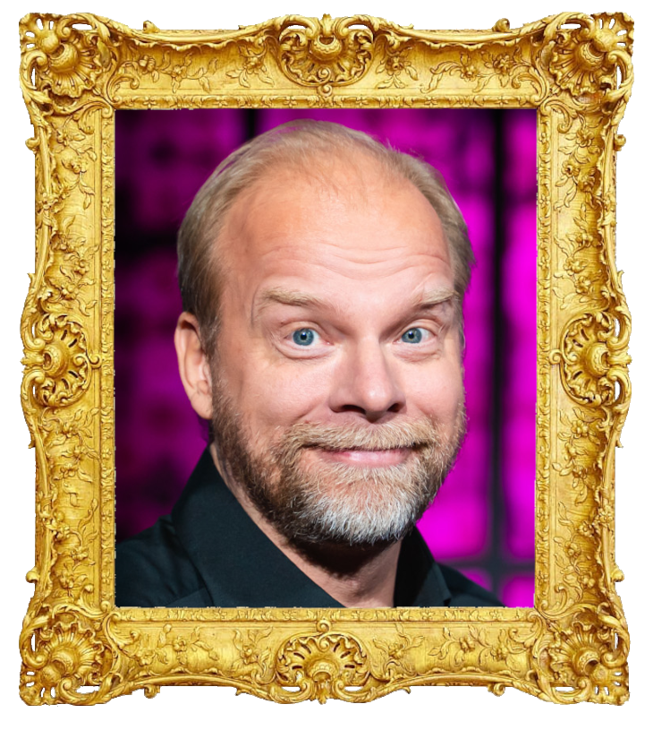 Headshot photo of Ville Myllyrinne surrounded with an ornate golden frame.