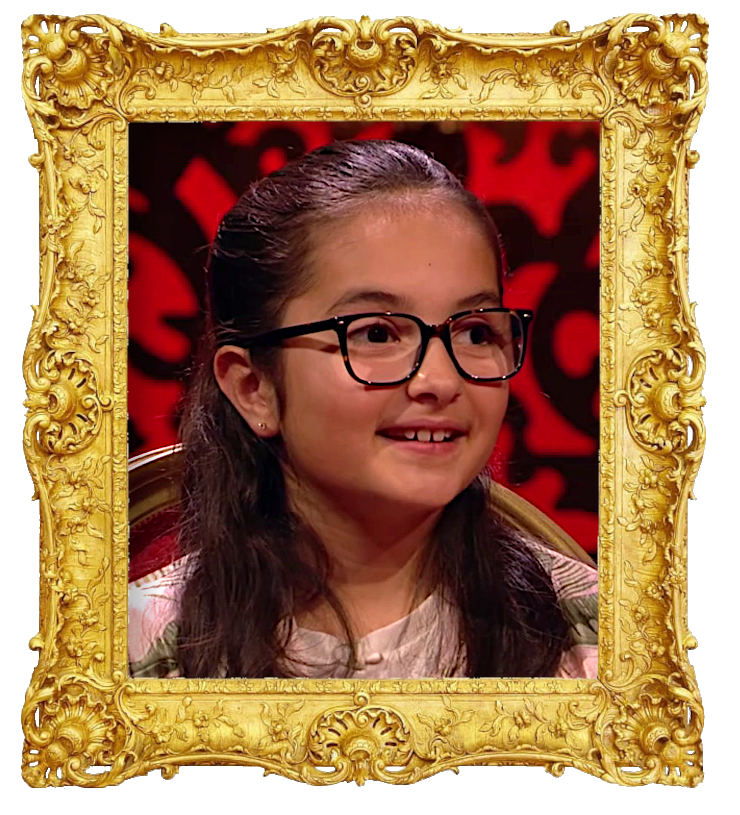 Headshot photo of Anita surrounded with an ornate golden frame.