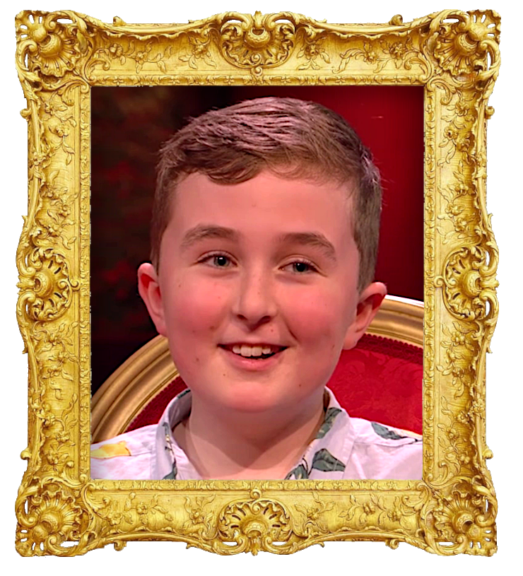 Headshot photo of Reuben surrounded with an ornate golden frame.