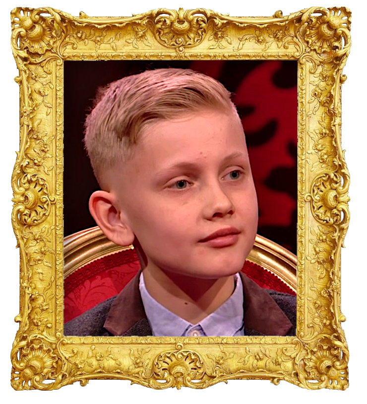 Headshot photo of Finley surrounded with an ornate golden frame.