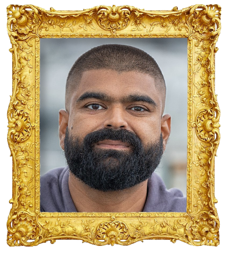 Headshot photo of Abubakar Hussain surrounded with an ornate golden frame.