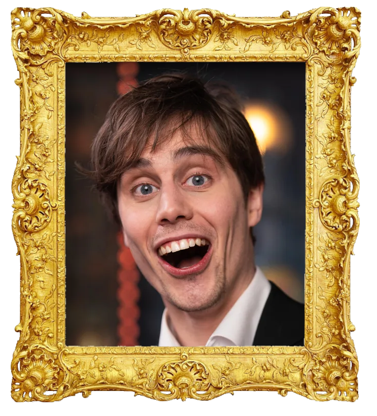 Headshot photo of Victor Beer surrounded with an ornate golden frame.