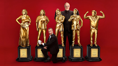 Cover image for the second Champion of Champions special of the UK show Taskmaster, picturing the cast of the special.